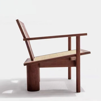 Fauteuil d'appoint moderne en bois massif noir personnalisable, assise en rotin tressé à la main, accoudoirs géométriques, pour salon, hôtel, loisirs