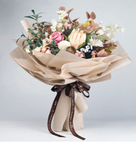 Papier d'emballage pour bouquet en tissu non tissé spunbond en matériau PET résistant au vieillissement, personnalisable en couleur, rouleau de tissu non tissé PET