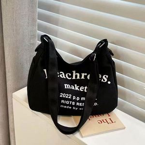 Sac fourre-tout en toile de coton imprimé lettres avec fermeture à bouton, taille moyenne, vintage, grande capacité, sac de shopping bandoulière pour lycéens/collégiens - Product Image 1