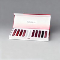 Boîte cadeau pour gloss à lèvres à impression numérique, ensemble de crayons à lèvres et de gloss à lèvres, boîte d'emballage en carton en forme de livre, boîte d'emballage pour rouge à lèvres