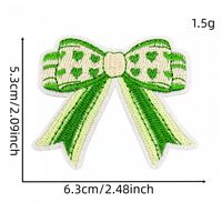 En gros, Patchs thermocollants brodés motif nœud vert, Appliques nœud trèfle à carreaux et pois pour pinces à cheveux, vêtements, sacs et décoration DIY