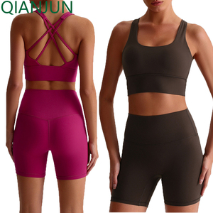 Logotipo personalizado Deportes de secado rápido 2 piezas Conjunto corto Ropa de gimnasio Sujetador y pantalones cortos de cintura alta Conjunto de yoga Fitne s Conjuntos de entrenamiento para mujer - Product Image 1