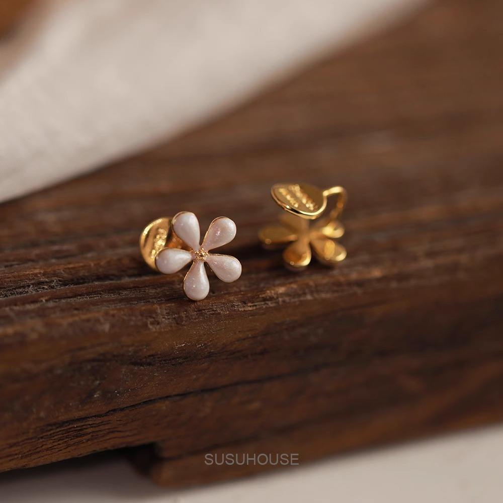 Pintura al óleo sensación de flor blanca mosquito bobina disco clip de oreja