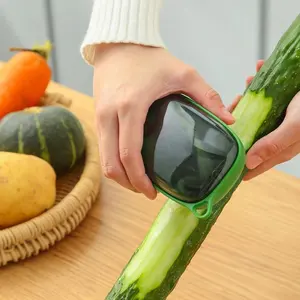 2024 nuevo almacenamiento Simple pelador magnético vegetal melón y pelador de frutas caja de almacenamiento de cocina raspador creativo