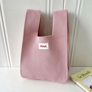 Bolso de mano de punto Macron colorido con logo impreso personalizado al por mayor, bolso tote de punto de color sólido para muñeca - Product Image 5