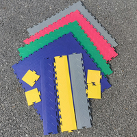 Gummi-PVC-Bodenbelag Ineinandergreifende Fliesen für Garagenboden Matten für Schwerlast-Lager Werkstatt Hersteller aus China