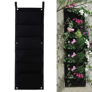 Macetas Colgantes Verticales de Diseño Moderno con 7 Bolsillos, Hechas de Fibra Vegetal para Plantas de Pared - Product Image 1