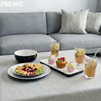 Vente en gros de vaisselle en céramique de style américain moderne, écologique, blanche et noire, assiettes et bols en porcelaine brillante, restaurant, hôtel