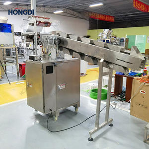 Machine verticale de type seau pour le remplissage et l'emballage automatique de granulés irréguliers en sacs plastiques, pour aliments, snacks, produits chimiques, à moteur. - Product Image 6