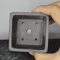 Pot à bonsaï miniature en argile violette fait main avec un design de pieds en forme de nuage