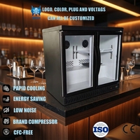 Réfrigérateur minibar à double zone de température pour hôtel, avec porte en verre trempé, adapté au réfrigération des boissons.