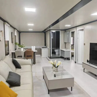 Maison de conteneur contemporaine modulaire de luxe en acier préfabriquée de 20 pieds extensible 2 chambres à coucher grand-mère plate pour bureau Villa Australie
