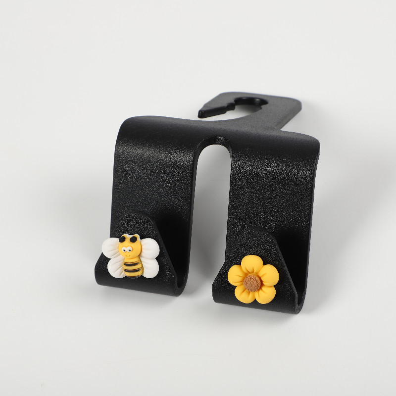 Fleur jaune à cinq pétales d'abeille ailée