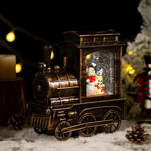 Decorazioni natalizie: trenino, sfera di cristallo, neve artificiale, carillon, regali, Babbo Natale, luce notturna - Product Image 4