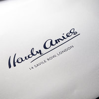 Sacs cadeaux en papier d'emballage personnalisés avec logo imprimé, motifs multicolores, papier artistique, vente chaude, avec ruban