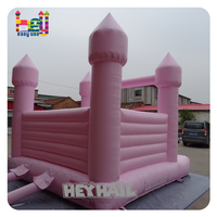 Château gonflable rose pâle macaron pour enfants et adultes, idéal pour la location lors de mariages et fêtes
