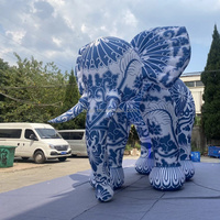 Modèle d'animal gonflable géant réaliste et accrocheur, éléphant gonflable de style traditionnel chinois avec motif floral pour les événements