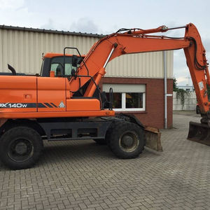 Excavatrice sur pneus Doosan 140w d'occasion à vendre en Chine - Product Image 1