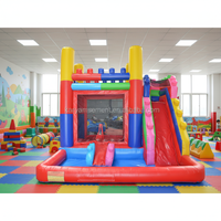 Château gonflable de parc d'attractions à prix d'usine avec blocs de construction, toboggan et piscine à balles à vendre
