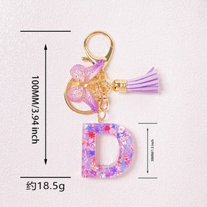 Llavero con Inicial <span class=keywords><strong>de</strong></span> Letra Morada, para Bolso, <span class=keywords><strong>de</strong></span> la A a la Z, con Borla <span class=keywords><strong>de</strong></span> Mariposa, Lentejuelas <span class=keywords><strong>de</strong></span> Resina, Letra del Alfabeto, para Mujer - Product Image 2