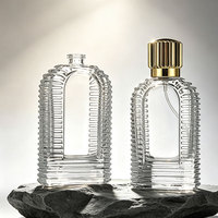 Flacon pulvérisateur de parfum rond en verre transparent de luxe personnalisé 50 100 ml
