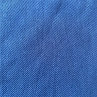 Tela de mezclilla de sarga de punto elástico de algodón y Spandex de poliéster de alta calidad para jeans