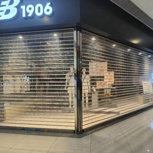 Porte de sécurité automatique moderne combinée en panneau PVC et structure en alliage d'aluminium, antivol et offrant une visibilité optimale pour les devantures de magasins, centres commerciaux et entrepôts - Product Image 2