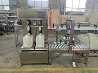 Machine de remplissage et de bouchage semi-automatique pour bidons de 5 kg, 10 kg, 15 kg, 25 kg, seaux, fûts, barils et jerricans de peinture
