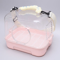 Cage de transport portable moderne et simple en plastique solide pour oiseaux, avec design panoramique à 360° et petite taille, idéale pour les voyages