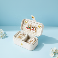 Boîte à bijoux portable mini rectangulaire de style euro-américain pour le rangement des boucles d'oreilles, des chaînes d'oreilles, des rouges à lèvres et des bagues