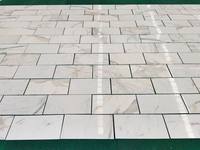 Guanmay Vente en gros Carreaux de marbre blanc Calacatta pour carreaux de sol et de mur Pierre naturelle Décoration en marbre
