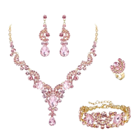 Parure de mariée quatre pièces de luxe pour femme, plaqué or poli, motif floral, strass rose, service de personnalisation du logo, vente en gros directe usine