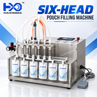 Machine de remplissage automatique multi-têtes pour sachets de liquides, jus, vin, eau, boissons et emballage en pochettes souples