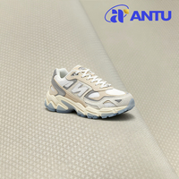Cuir PU microfibre à grille croisée haute résistance à l'abrasion, cuir synthétique durable pour les empeignes de chaussures de sport