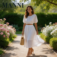 Ensemble élégant de style français, haut court en coton et lin blanc brodé à œillets, manches bouffantes, jupe midi évasée, vêtements de créateur pour femmes