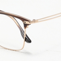 Monture de lunettes optiques en titane de haute qualité 565 pour homme, femme, unisexe, avec branches élastiques et design géométrique