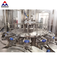 Machine de remplissage automatique d'eau minérale potable Ligne de production complète Moteur à engrenages PLC pour boissons Bouteilles en plastique Moteur à pompe