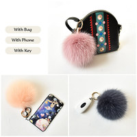 Véritable fourrure de renard pompon porte-clés porte-clés en fourrure sur le sac mignon bricolage moelleux pompon pendentif accessoires