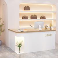 Nouveau bureau de réception en L en bois massif crème moderne 2026, comptoir d'angle de luxe pour salon de beauté avec éclairage LED et rangement