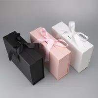 กล่องของขวัญที่กำหนดเองบรรจุภัณฑ์สีดำสีชมพูพร้อมริบบิ้นโลโก้กล่องปิดแม่เหล็กพับขนาดใหญ่หรูหราพับแข็ง