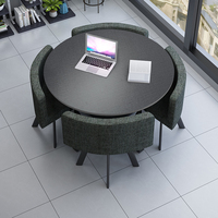 Ensemble de salle à manger moderne et luxueux avec table ronde en bois et 4 chaises rembourrées en métal pour la salle à manger