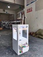 Mini machine à griffes à monnayeur économique pour la Malaisie, type grue à jouets, en métal trempé, vente en gros usine