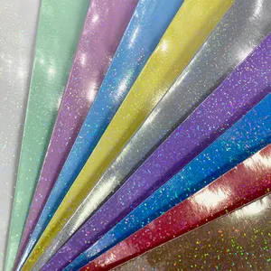 L'effetto Laser riflette il tessuto in ecopelle glitterata Dot per decorare gli accessori di abbigliamento