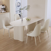Ensemble de table à manger semi-ronde en pierre de style crème français, moderne et luxueux, avec chaises en bambou pour petit salon domestique
