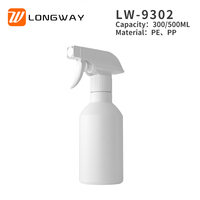 Bouteille d'huile capillaire en plastique personnalisée de 300ml/500ml avec buse de pulvérisation à gâchette Matériau PETG PE Type d'étanchéité de la pompe Emballage de soins capillaires