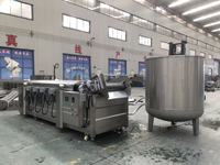 Friteuse industrielle entièrement automatique à cuisson continue pour la production de chips, d'arachides, de nuggets de poulet et de snacks