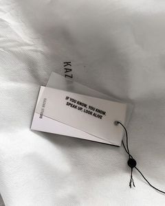 Custom <b>printed</b> logo clothing labels for men, women, and children, made with eco-friendly <b>paper</b> and UV technology. - Product Image 4