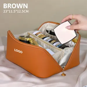 Borsa per il trucco cosmetica in pelle con cuscino in Pu di grande capacità con Logo personalizzato da viaggio impermeabile all'ingrosso con cerniera