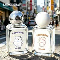 Botol Parfum Kaca Mini Murah Pabrik 30ml 50ml 100ml Botol Parfum Bulat Transparan Kosong dengan Pompa Semprot dan Tutup Bola Berwarna