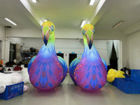 Lumières LED gonflables de dessin animé avec flamants roses colorés et dynamiques pour la décoration de scène à des fins publicitaires